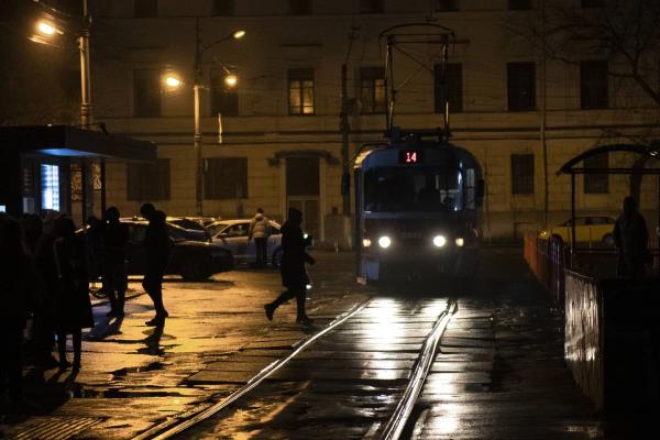 A tram arrives at a tram stop during a blackout in Kyiv, Ukraine, Sunday, Nov. 6, 2022.