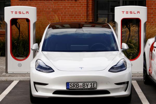Tesla cars are seen at the V3 supercharger equipment during the presentation of the new charge system in the EUREF campus in Berlin, Germany September 10, 2020. REUTERS/Michele Tantussi
